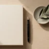 AI Client Machine ebook - phone flat-lay - AJNEXA