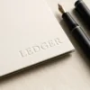The Cashflow Ledger - detail close-up - AJNEXA