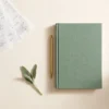 The Cashflow Ledger - desk lifestyle scene - AJNEXA