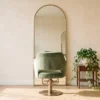 Intérieur d’un salon de coiffure indépendant quiet-luxury au lever du jour — AJNEXA Hair Salon Prompt Pack